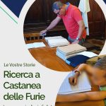 Padre e figlio che consultano registri